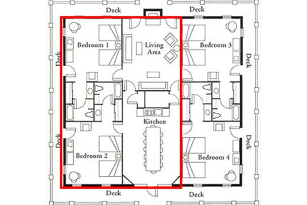This image is a floor plan with four bedrooms, a living area, kitchen, and surrounding deck. The main section is outlined in red.